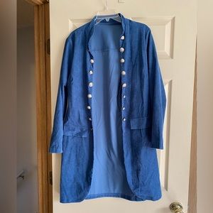 Long blue jacket with silver buttons